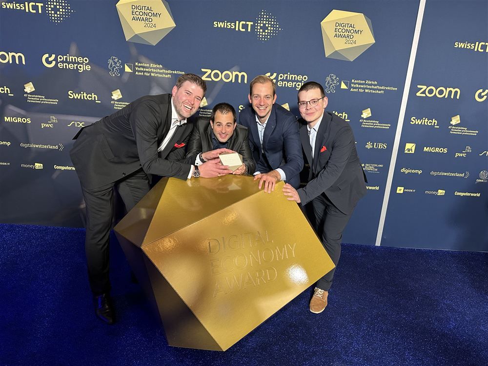 The Artifact team with the Digital Economy Award 2024 trophy