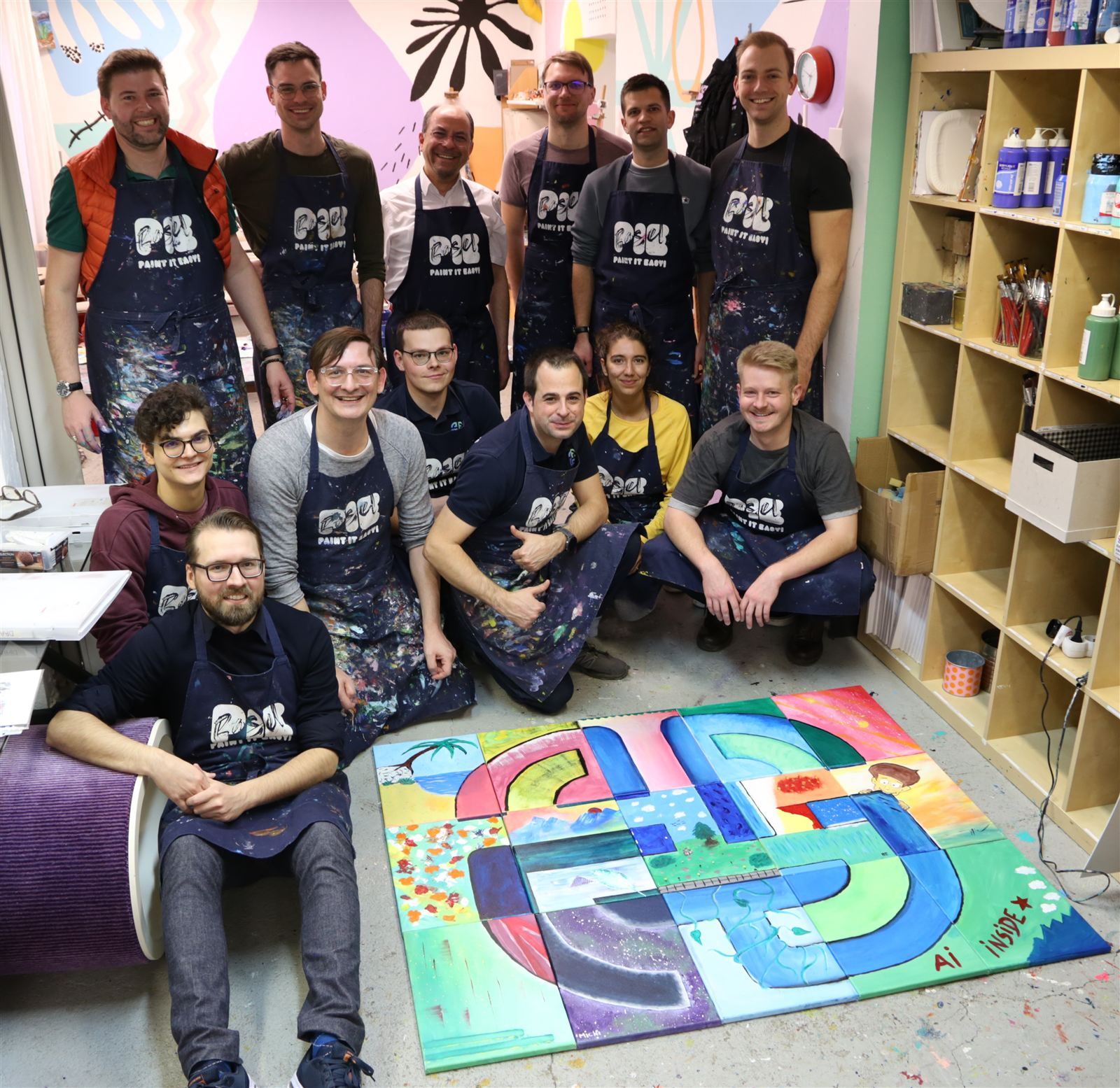 The Artifact team at a team painting event